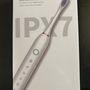 White Sonic Electric Toothbrush. One of the best around!